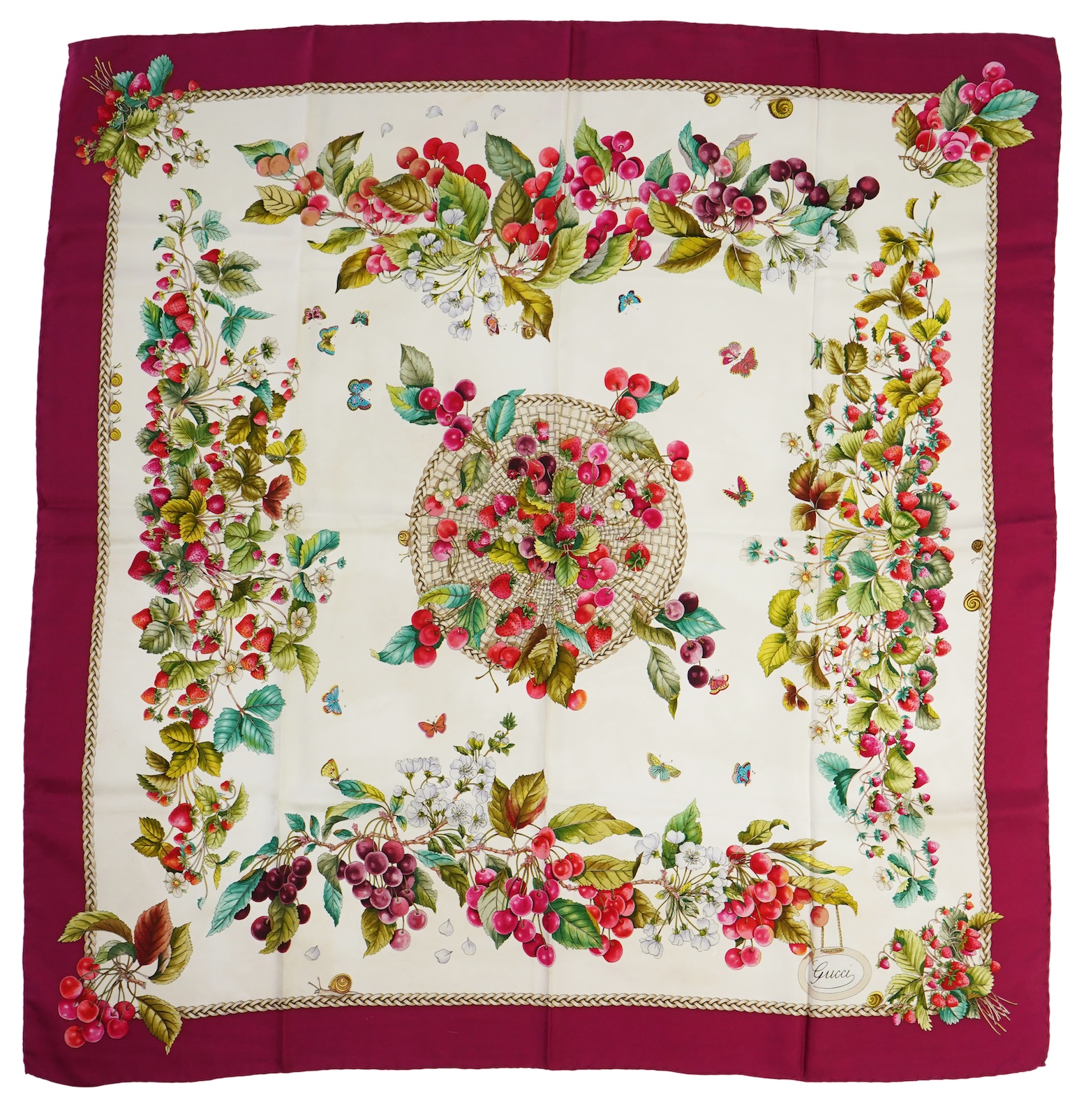 A vintage Gucci silk scarf with a design of strawberries and cherries, 86 x 87cm